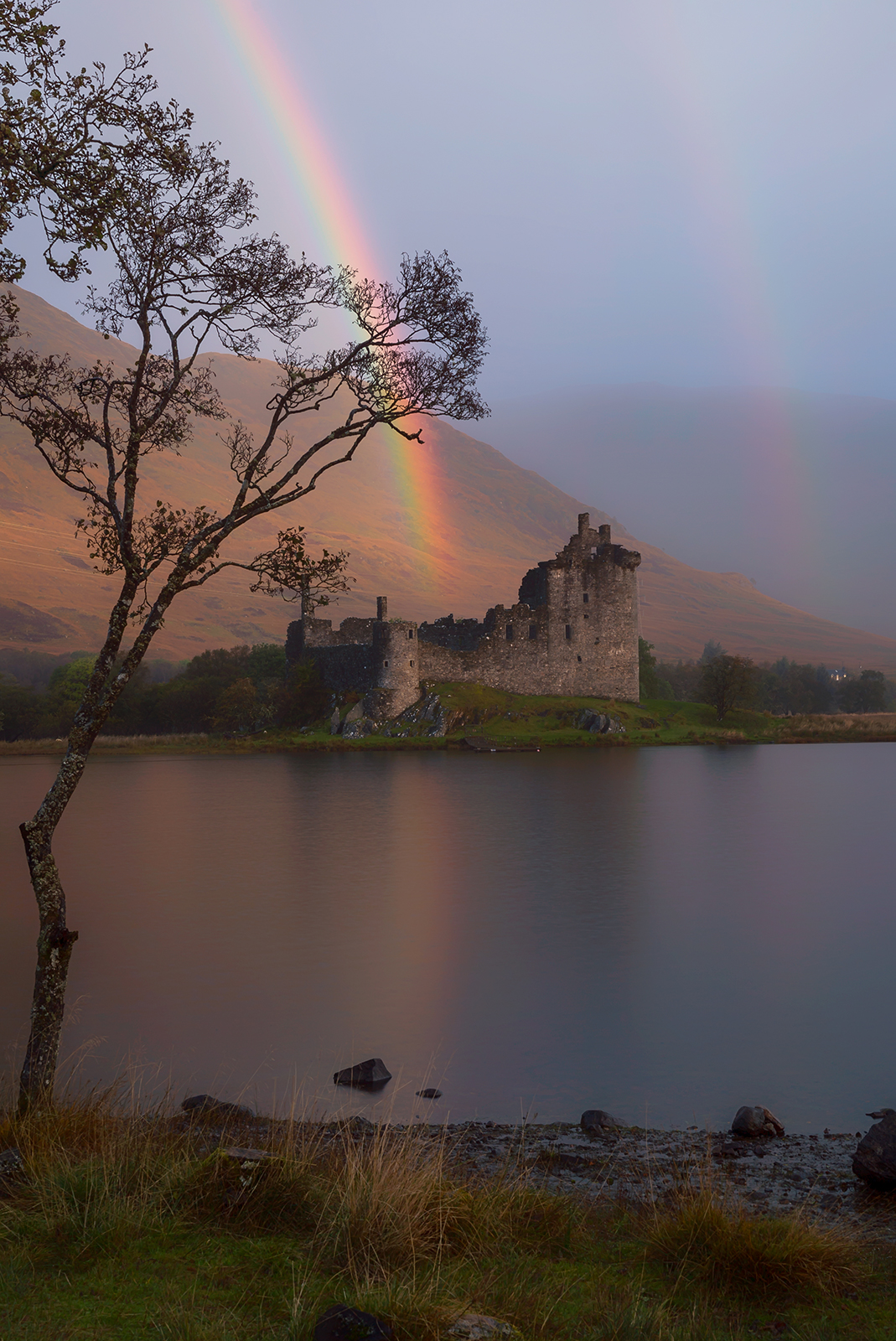 A double rainbow over Kilchurn Castle on the Scotland Photography Workshop